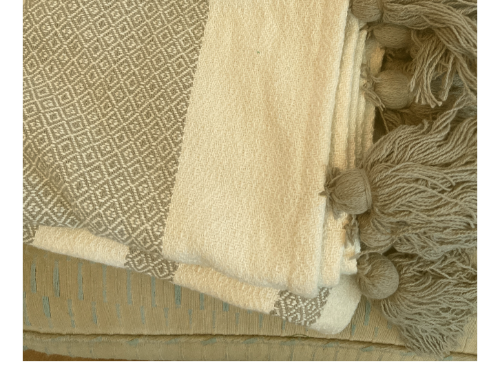 Cream tassel online throw