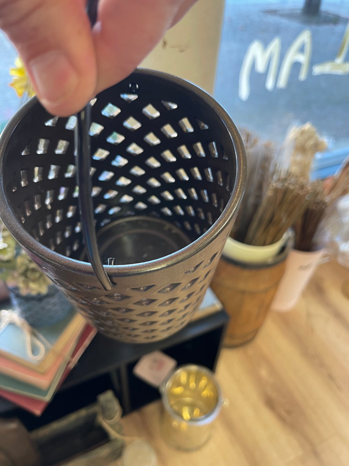 Hanging ceramic candle holder