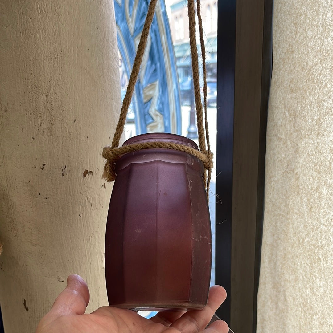 Purplish glass candle hanger