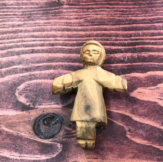 Carved wood man figurine