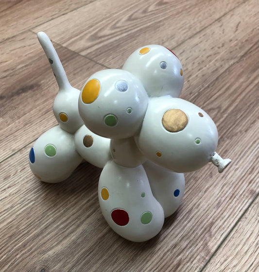 Balloon dog sculpture with spots