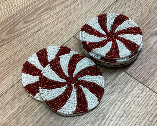 Hand made Red and White Beaded Coasters, set of 7.