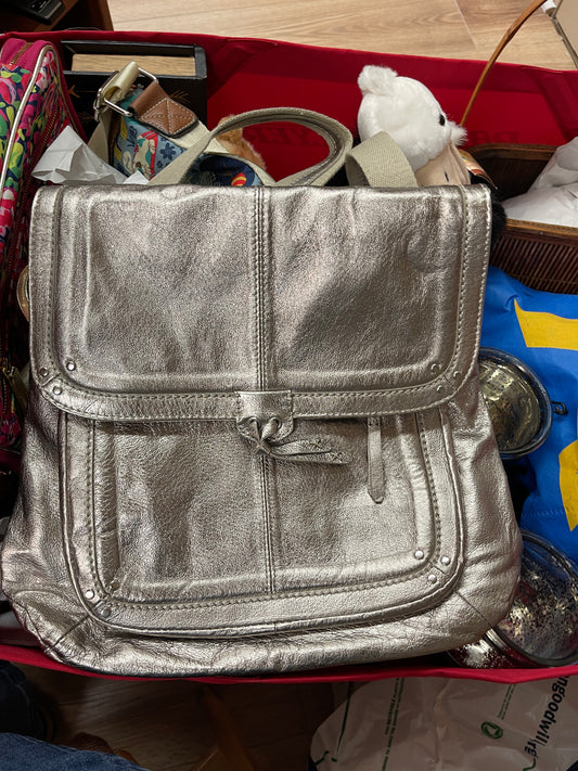 The Sak backpack/crossbody silver bag