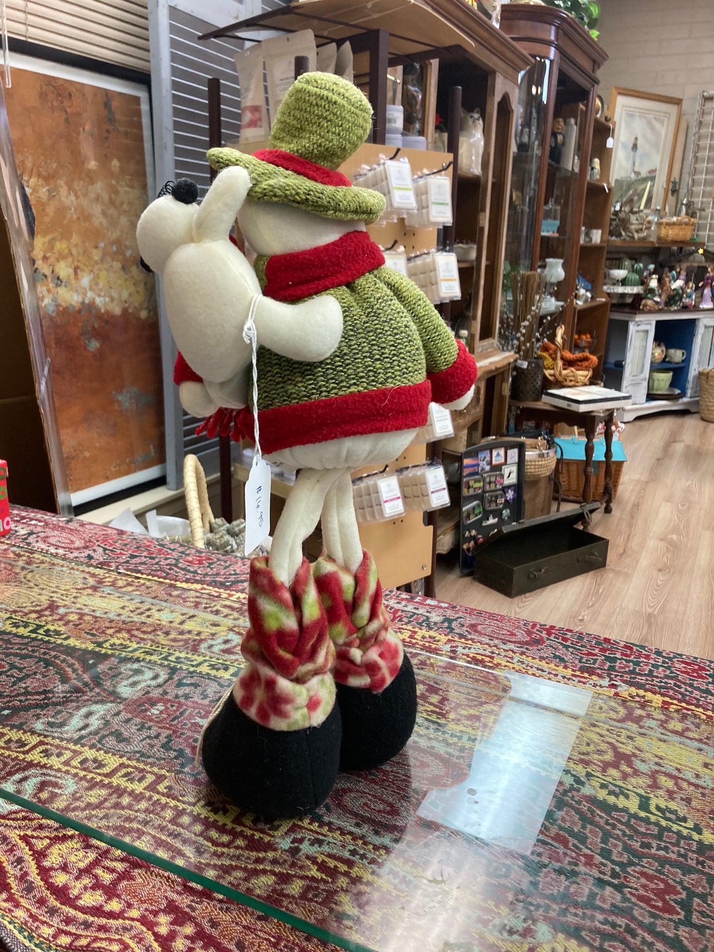 Standing snowman with green sweater